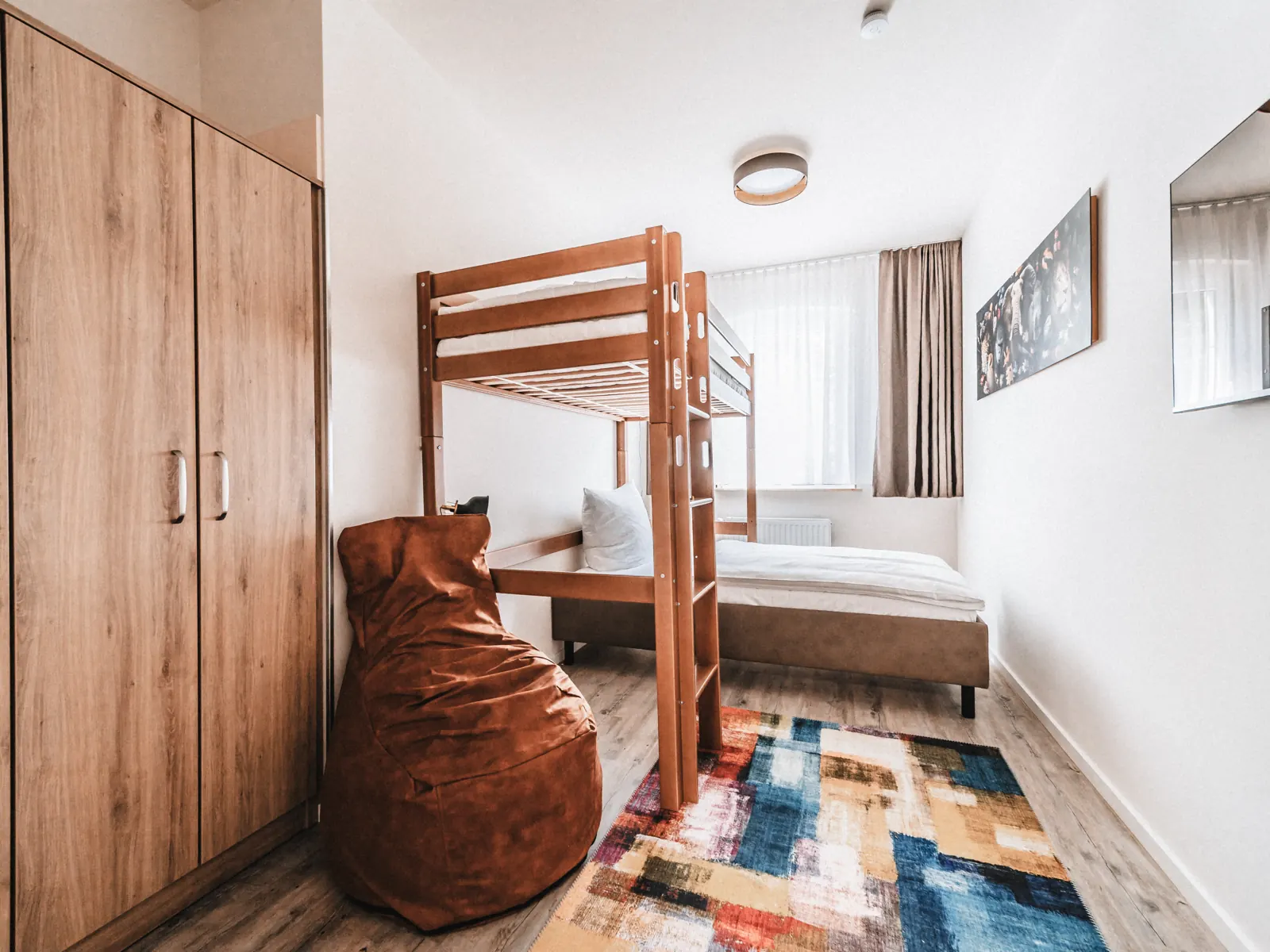 Children’s room of the Big Family Apartment with bunk bed
