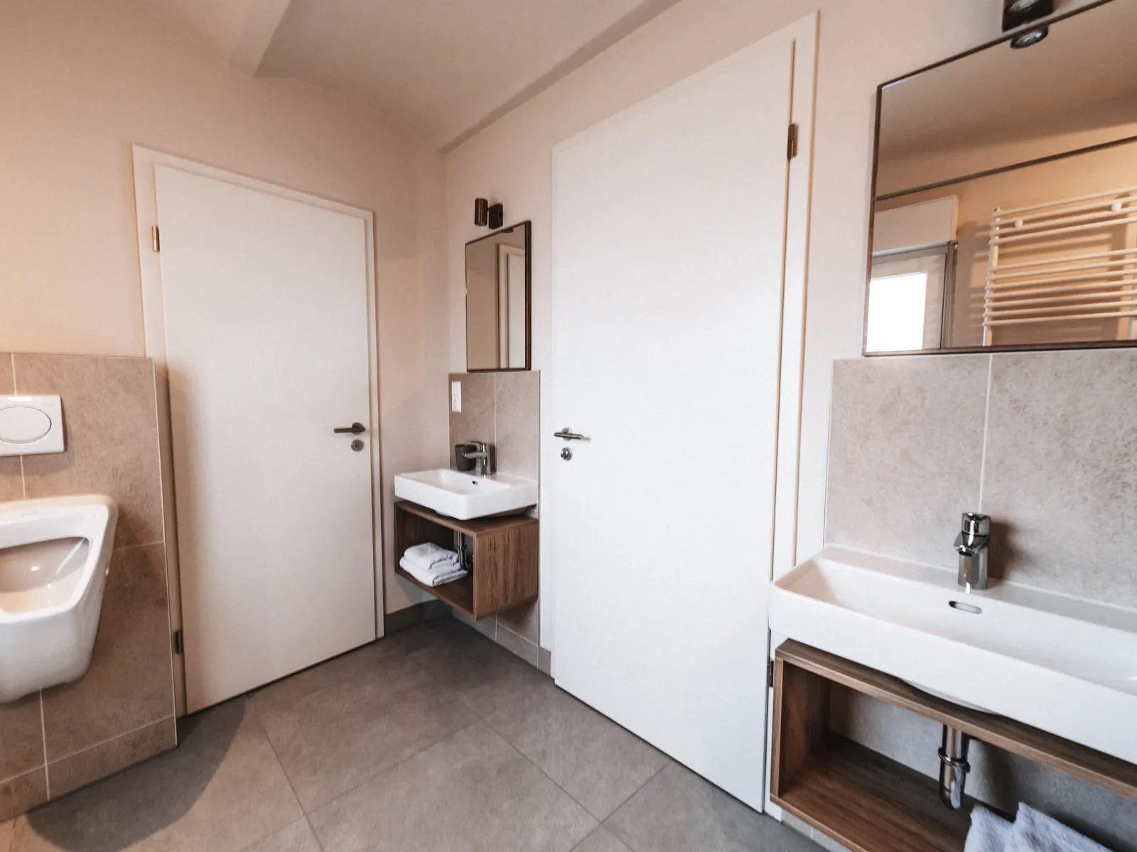 Bathroom with shower in the Petit Family Apartment